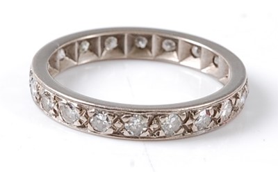 Lot 2674 - A white metal diamond full hoop eternity ring...