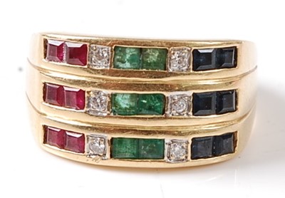 Lot 2675 - A yellow metal ruby, emerald, sapphire and...