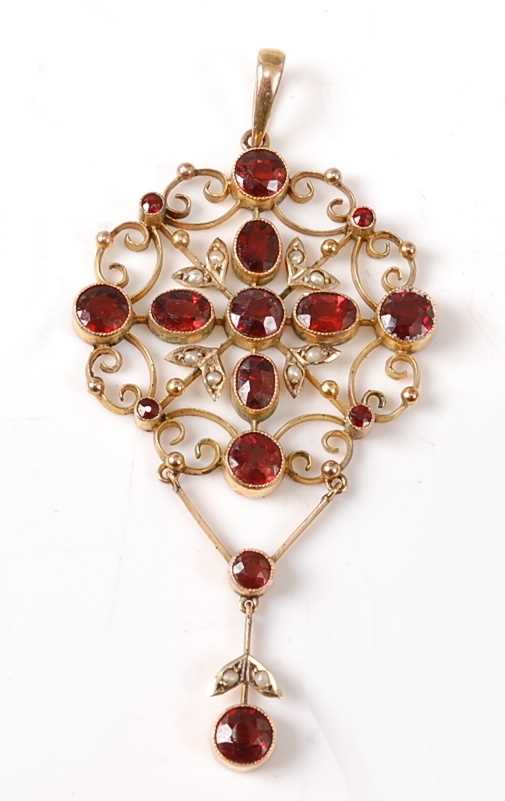 Lot 2667 - A yellow metal Edwardian garnet and seed pearl...