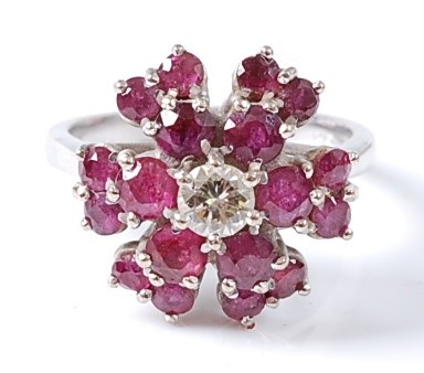 Lot 2683 - A white metal ruby and diamond circular...