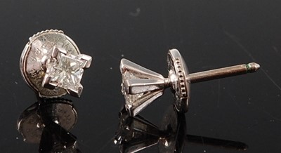 Lot 2680 - A pair of white metal diamond single stone...