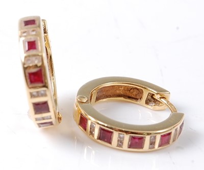 Lot 2697 - A pair of 18ct yellow gold ruby and diamond...