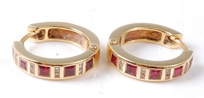 Lot 2697 - A pair of 18ct yellow gold ruby and diamond...