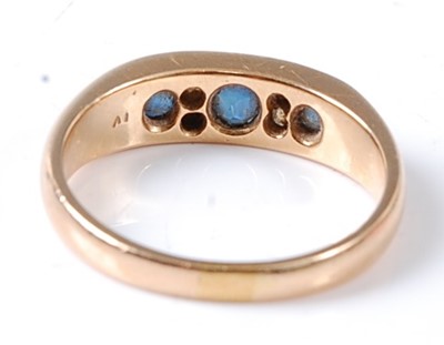 Lot 2698 - An Edwardian 18ct yellow gold sapphire and...