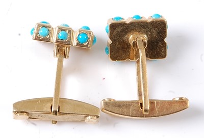 Lot 2713 - A pair of yellow metal turquoise cufflinks...