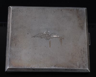 Lot 2453 - A WW II silver pocket cigarette case, having...