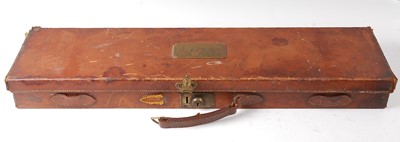 Lot 2557 - An early 20th century brown leather shotgun...