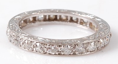 Lot 2728 - A white metal diamond full hoop eternity ring,...