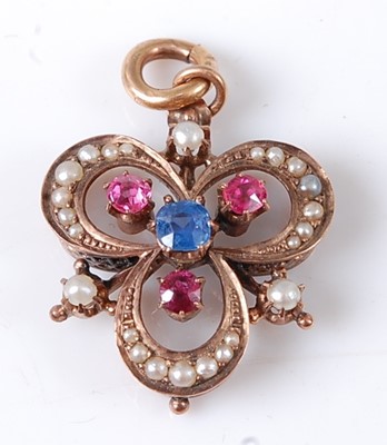 Lot 2735 - An Edwardian rose metal, sapphire, ruby and...