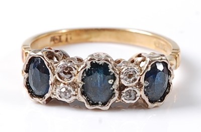 Lot 2740 - A yellow and white metal, sapphire and diamond...
