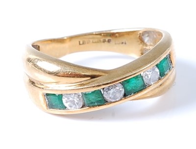 Lot 2742 - An 18ct yellow gold, emerald and diamond...