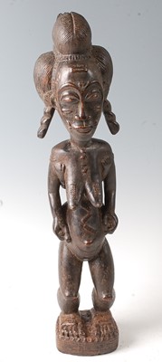 Lot 80 - * A female ancestor figure, in standing pose...