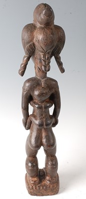 Lot 80 - * A female ancestor figure, in standing pose...