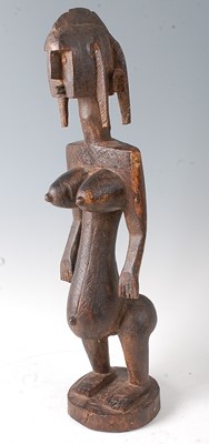 Lot 66 - * A large ancestor figure, carved as a female...