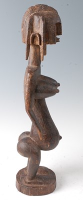 Lot 66 - * A large ancestor figure, carved as a female...