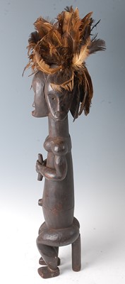 Lot 72 - * A Janus Bieri figure, carved as a male in...