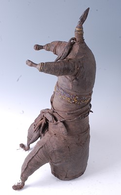 Lot 75 - * A large Power fetish figure, of hide covered...