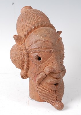 Lot 133 - * A hand worked terracotta male head, Nok...