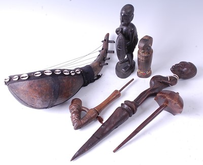 Lot 134 - * A collection of six tribal items, various...
