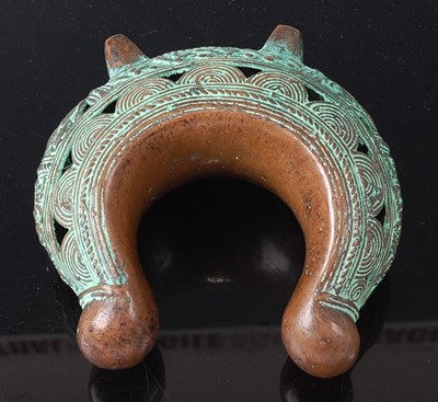 Lot 174 - * A cast copper currency bracelet, having...
