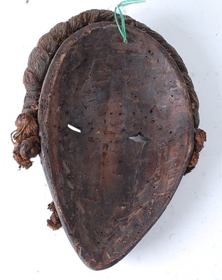 Lot 102 - * A "Racing" style mask, the hair and lips...