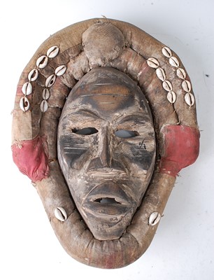Lot 106 - * An initiation mask, in original padded...