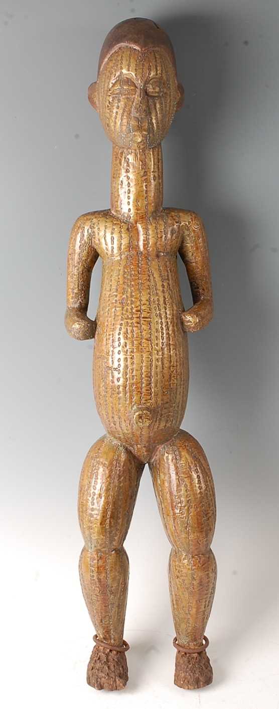 Lot 220 - * A large carved wooden power figure in the...