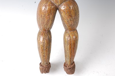 Lot 220 - * A large carved wooden power figure in the...