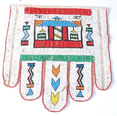 Lot 128 - * A leather apron with applied beadwork...