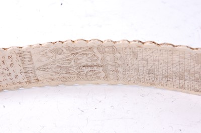 Lot 234 - * An animal bone divination wand, the centre...