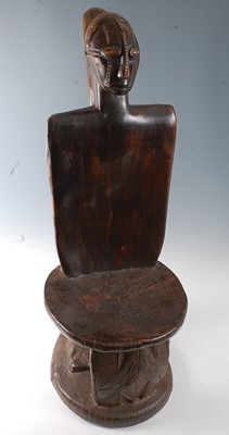 Lot 130 - * A large carved hardwood figural chief's?...