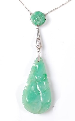 Lot 2780 - A white metal jadeite pendant, featuring a...