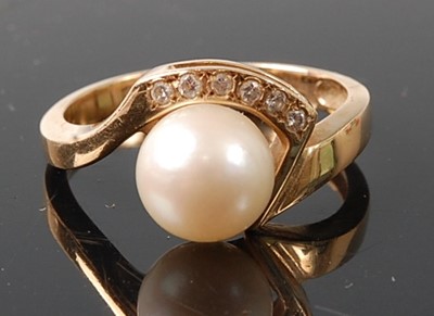 Lot 2788 - A yellow metal pearl and diamond crossover...