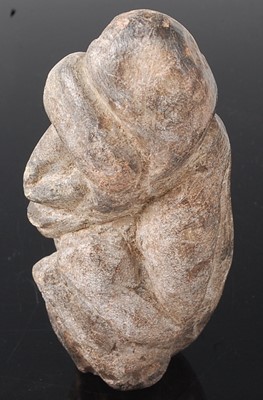 Lot 132 - * A hardstone ritual figure, carved as a man...