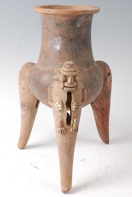 Lot 335 - * A pottery vessel, having a waisted neck to a...