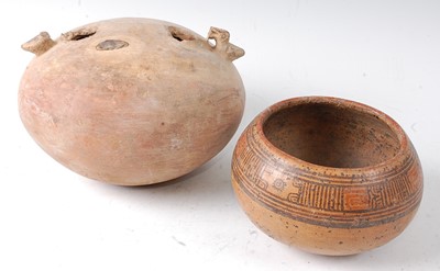 Lot 345 - * A pottery stirrup vessel, of typical squat...