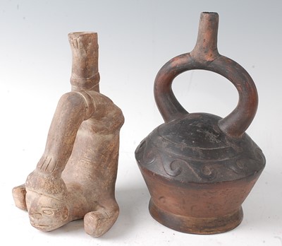 Lot 346 - * A pottery stirrup vessel, modelled as a male...