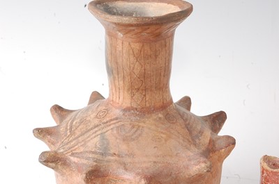 Lot 348 - * A pottery vessel, having a flared rim to a...