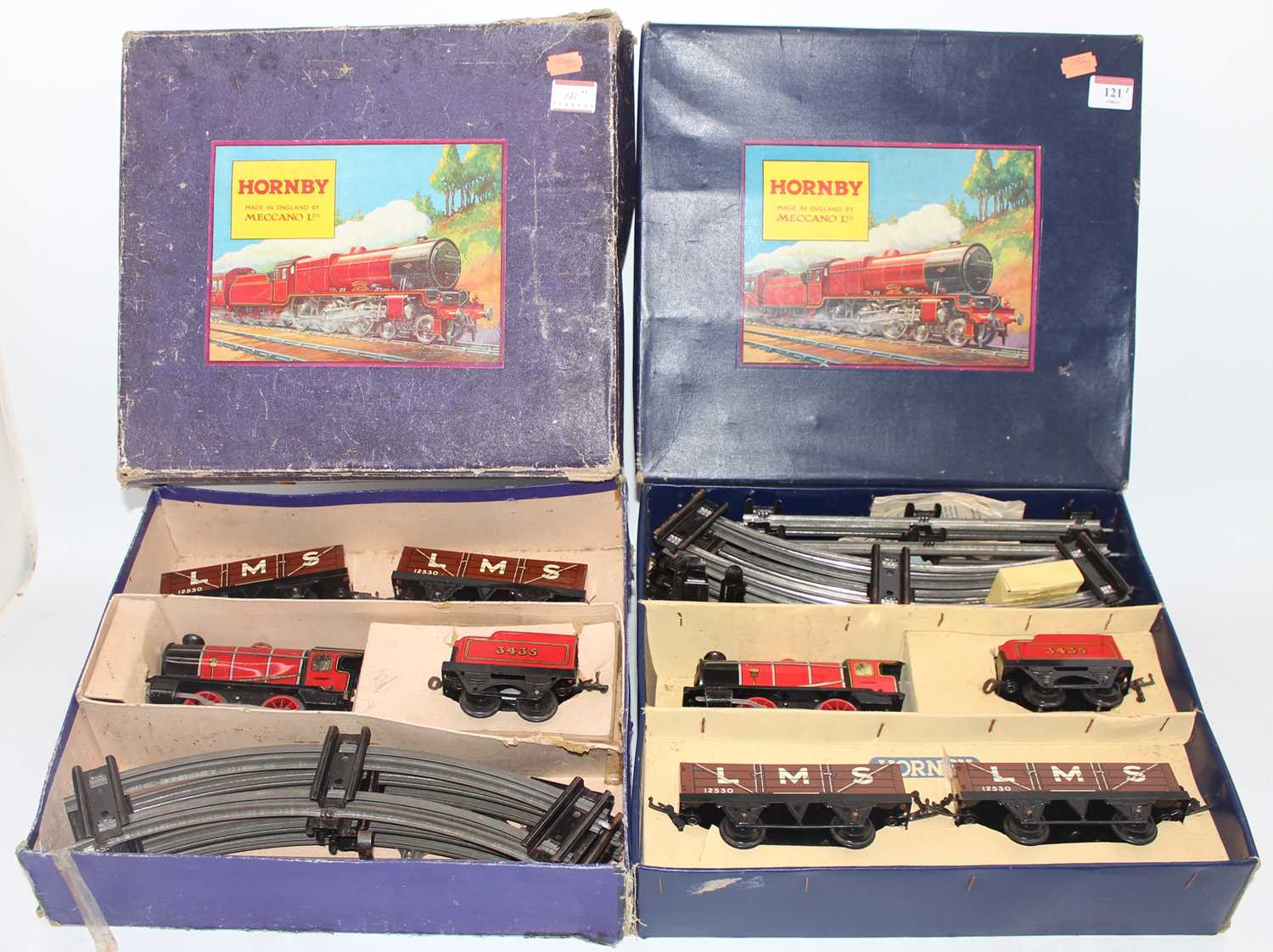 Lot 121 - Two Hornby M1 good sets: one with red loco and...