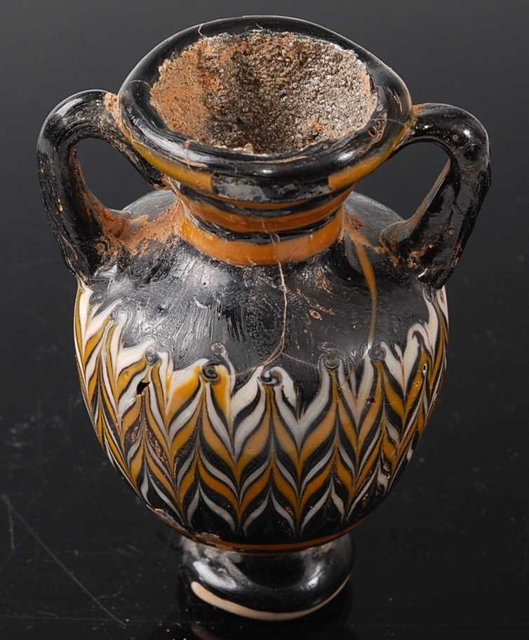 Lot 409 - * An Amphora type pottery vase, having twin...
