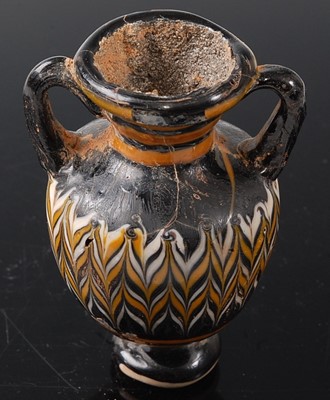 Lot 409 - * An Amphora type pottery vase, having twin...