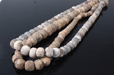 Lot 238 - * A graduated hardstone bead necklace, largest...