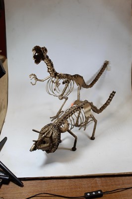 Lot 5 - A gold painted model of a dinosaur,...