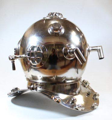 Lot 9 - A reproduction American Navy polished metal...