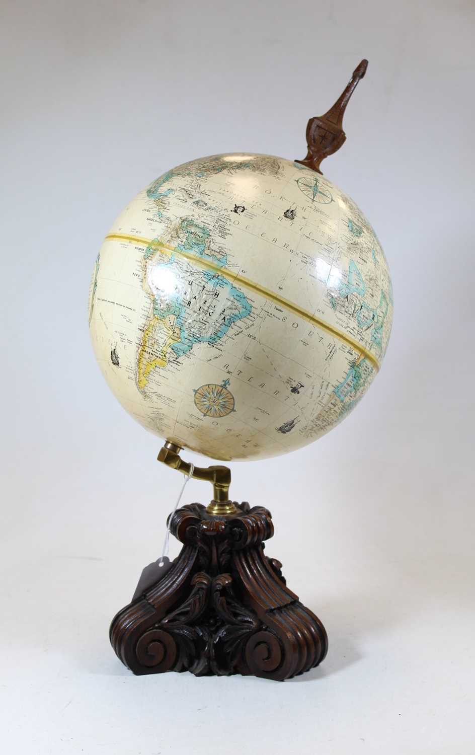 Lot 12 - A 20th century globe, mounted on a mahogany...