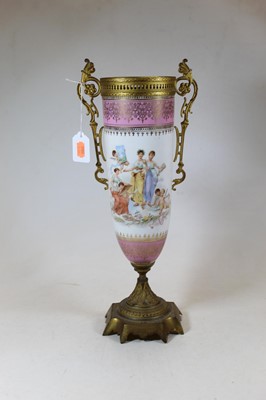 Lot 13 - A circa 1900 Continental porcelain and gilt...