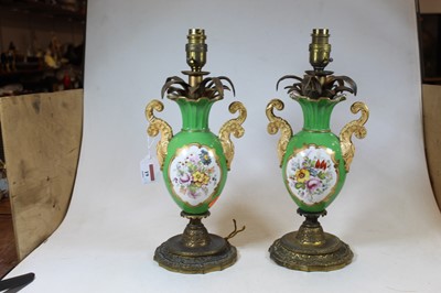 Lot 19 - A pair of early 20th century porcelain and...