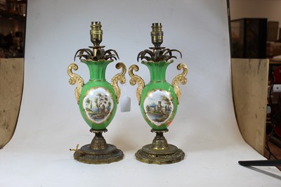 Lot 19 - A pair of early 20th century porcelain and...