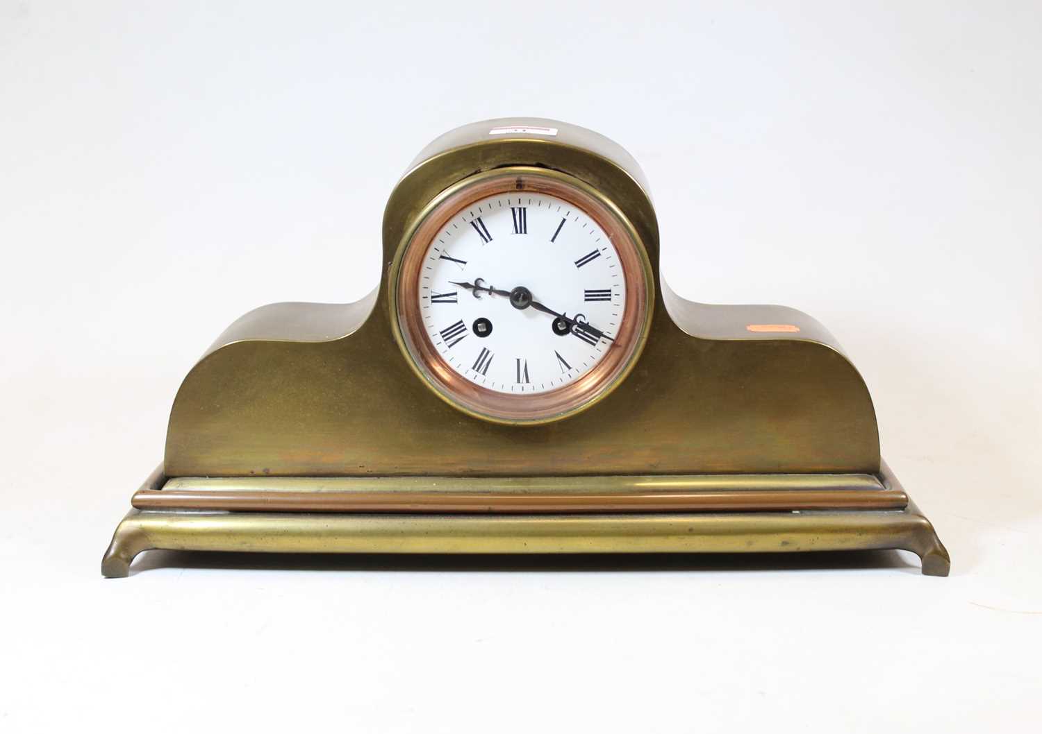 Lot 31 - A late 19th century brass cased mantel clock,...