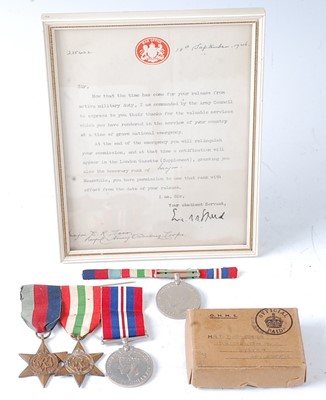 Lot 2141 - A group of four WW II medals to include...